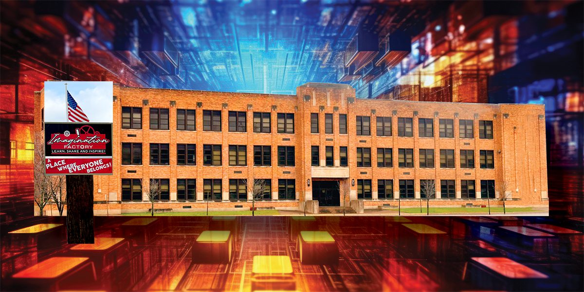 Modern building with glowing lights under a vibrant blue sky.